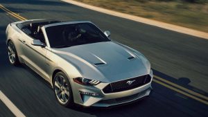 Silver 2019 Ford Mustang driving on the highway | Ford Dealer | Houston, TX
